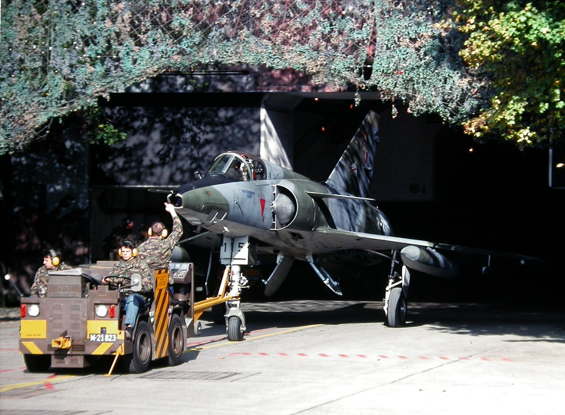 Mirage_2115_exits_cavern_Buochs
