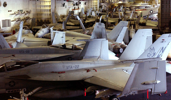 US Navy 070128 N 9712 C 003 Aircraft fill the hanger bays on board USS Ronald Reagan CVN 76 after recently embarking Carrier Air Wing One Four CVW 14